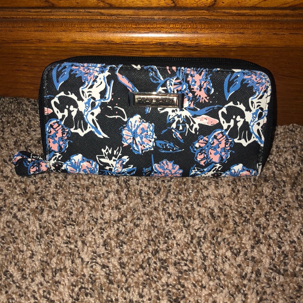 Tahari wallet. Slightly used. All zippers work correctly